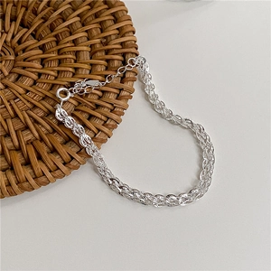 Braided S925 sterling silver chain bracelet with adjustable round clasp and metal luster