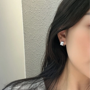 Minimalist S925 sterling silver square hoop earrings with polished finish on model