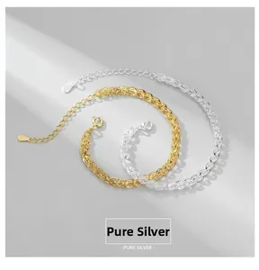 Detail of S925 sterling silver phoenix tail bracelets in gold and silver twisted weave