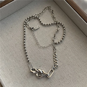 Collier en argent S925 avec pendentif cœur noué et chaîne mixte élégante