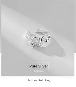 Detailed view of S925 sterling silver ring featuring unique crinkled metal texture