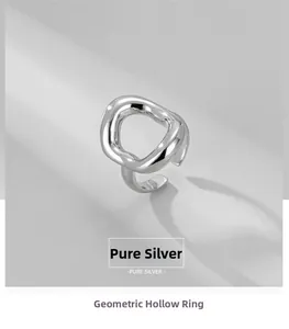 Detail view of S925 sterling silver hollow geometric ring with irregular open design