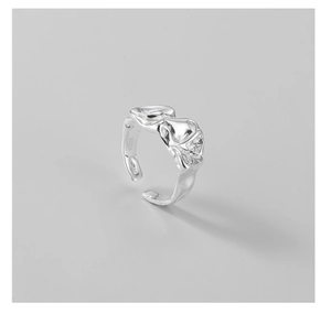 Close-up of S925 sterling silver ring featuring unique irregular wrinkled metal texture