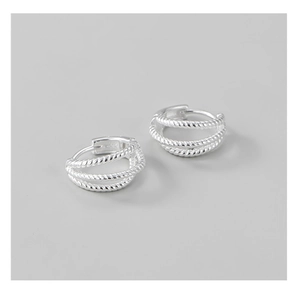 Detail of S925 sterling silver hoop earrings featuring a triple-layer twisted rope design