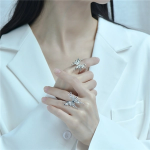 Artistic liquid metal butterfly open ring in silver for a minimalist aesthetic