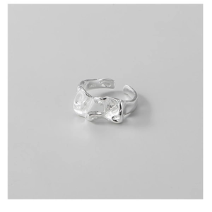 Macro shot of S925 sterling silver ring showing internal hallmark and crumpled texture