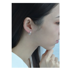 Elegant S925 sterling silver triple layer twisted hoop earrings on model ear