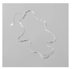Detail of multi-layer S925 sterling silver chain with lobster clasp and hallmark tag