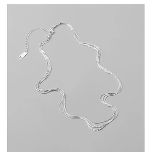 Close-up of S925 sterling silver multi-layer necklace with lobster clasp and extension
