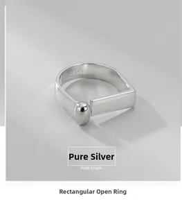 Detailed view of S925 sterling silver minimalist geometric ring with open band design