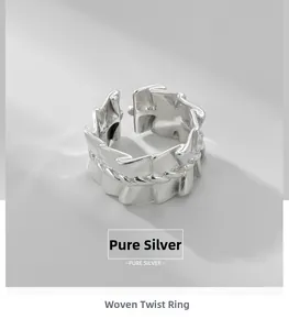 Macro shot of S925 sterling silver ring featuring unique pleated and twisted texture