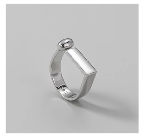 Close-up of S925 sterling silver ring with asymmetric ball and rectangular design