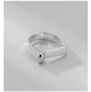 Detail showing S925 hallmark on minimalist geometric silver ring with polished finish