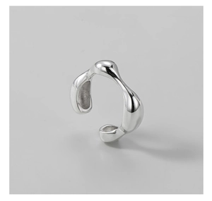Macro detail of the S925 sterling silver stamp on the polished minimalist open ring