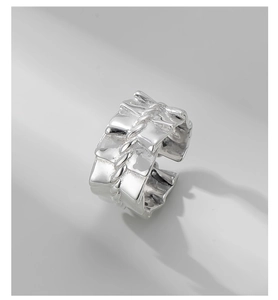 Detailed close-up of S925 sterling silver ring featuring unique geometric block textures
