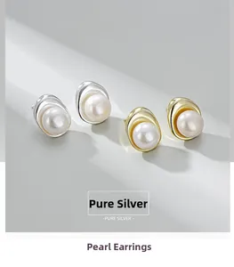 Detail of S925 sterling silver pearl stud earrings in gold and silver finishes