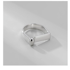 Macro shot of 925 sterling silver ring showing geometric rectangular design and S925 stamp