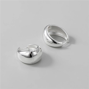 Polished S925 sterling silver hoop earrings with wide glossy finish and minimalist design