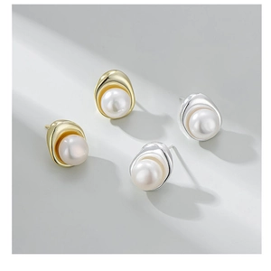 Detailed view of S925 silver irregular pearl stud earrings in gold and silver finishes
