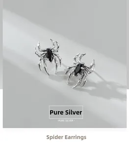 Detailed view of S925 sterling silver spider earring with marquise-cut black zircon stone