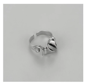 Detailed view of S925 sterling silver ring with an abstract wavy and folded artistic design