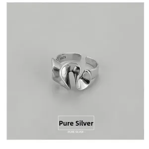 Macro detail of S925 sterling silver stamp on abstract irregular vintage ring