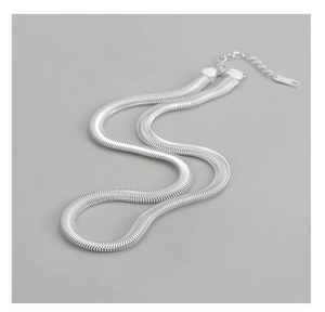 Detail of S925 sterling silver flat snake chain necklace with lobster clasp and extender