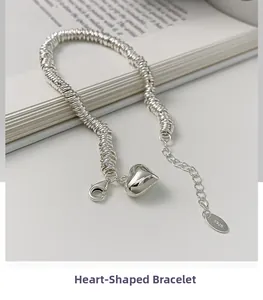 Macro shot of S925 sterling silver heart bracelet with adjustable chain and S925 hallmark