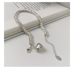 Detail of S925 sterling silver heart bracelet showing lobster clasp and extension chain