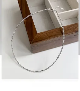 Detailed view of 925 sterling silver beaded choker necklace with twisted texture
