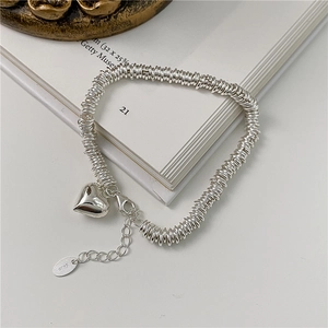 Polished S925 sterling silver heart bracelet with minimalist multi-circle chain design