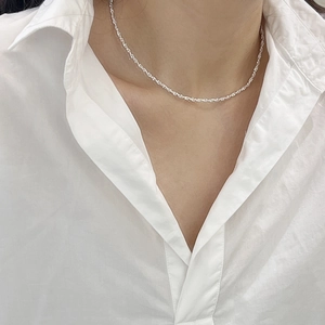Elegant 925 sterling silver shimmering rope chain necklace worn on female model