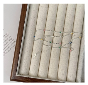 Detail of S925 sterling silver chain with colorful beads and hallmark tag