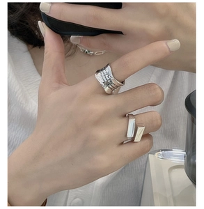 Detail of S925 sterling silver geometric square ring with modern minimalist texture