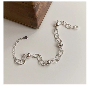 Close-up of 925 sterling silver beaded chain bracelet with adjustable lobster clasp