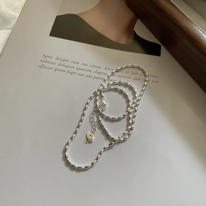 Minimalist 925 sterling silver rice bead necklace with adjustable lobster clasp and tag