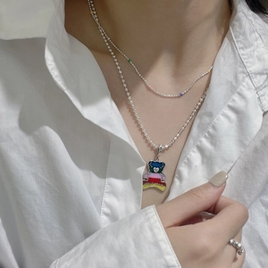 Double-layered S925 silver necklace featuring colorful beads and a multilayered bear pendant