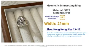 Detailed view of polished S925 sterling silver ring featuring a wide geometric criss-cross design