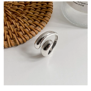 Close-up of S925 sterling silver hallmark on the inner band of the glossy open ring