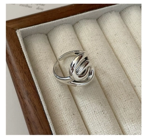 Detailed close-up showing the S925 sterling silver hallmark inside the twisted ring band