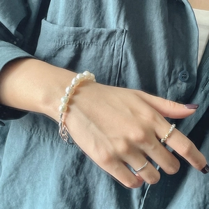 Minimalist S925 silver irregular streamline pearl bracelet with twist rope rings