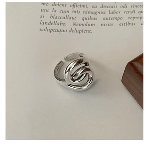 Macro shot of S925 sterling silver stamp on the inner band of the twisted ring
