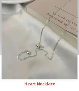 Macro detail of adjustable heart pendant necklace with S925 sterling silver slider chain