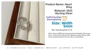 Macro shot of S925 sterling silver ring featuring hollow heart patterns and adjustable band