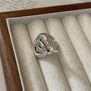 Polished S925 sterling silver multilayer overlapping ring in a luxury jewelry box