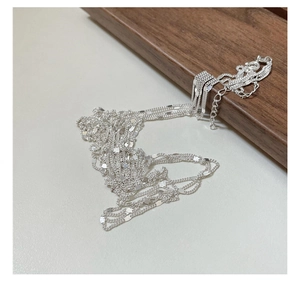 Close-up of S925 sterling silver triple layer lace chain with lobster clasp and extender
