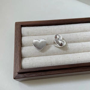 S925 sterling silver heart earrings with one brushed and one polished finish