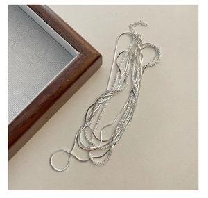 Detailed view of layered S925 silver necklace with lobster clasp and extension chain