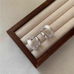 925 sterling silver hoop earrings with a mix of polished and brushed interlocking rings