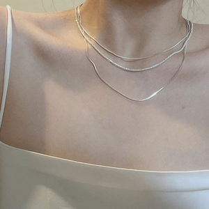 Three-layer S925 sterling silver necklace featuring layered snake and shimmering chains
